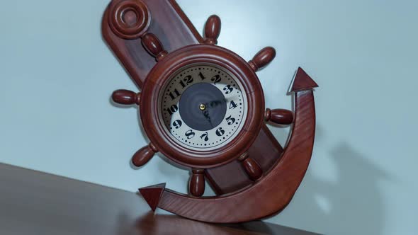 Timelapse of the Clock in the Shape of an Anchor and a Ship's Helm