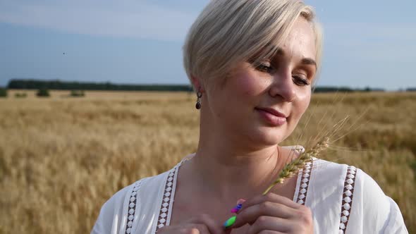 Woman portrait on wheat field