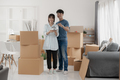 Young couples move into homes and apartments, Moving house, New house. - PhotoDune Item for Sale