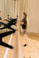 Ballerina in pointe pose. Beautiful ballet dancer stretching in class. Ballerina woman training - PhotoDune Item for Sale