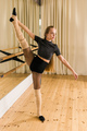 Ballerina in pointe pose. Beautiful ballet dancer stretching in class. Ballerina woman training - PhotoDune Item for Sale