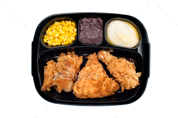 Chicken TV dinner in plastic tray