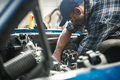 Car Mechanic Repairs a Classic Car Inside His Workshop - PhotoDune Item for Sale