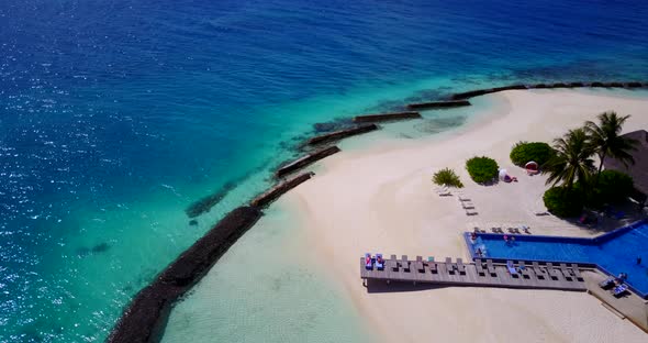 Tropical aerial abstract view of a summer white paradise sand beach and blue ocean background in hig