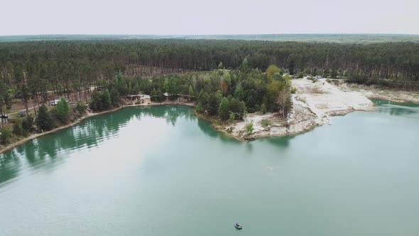 Aerial View of Lake Pine Forest on the Background