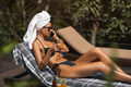 Drinking Luxury Woman With Smart Phone During Summer Vacations at the Pool - PhotoDune Item for Sale
