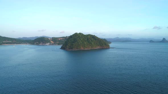 Aerial View From Above on a Tropical Island at Sunset