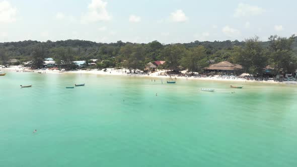 Fly over seal waters and approach beach bar, Koh Rong Samloem. Tropical Holidays 