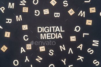 DIGITAL MEDIA word written on dark paper background. DIGITAL MEDIA text for your concepts