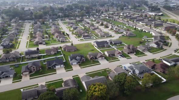 Aerial view of newer residential neighborhood in western Wisconsin. Symmetrical lines of streets.