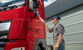 Semi Truck Driver Receiving Cargo Documentation - PhotoDune Item for Sale