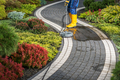 Power Washing Residential Garden Pathway Using Concrete Surface Attachment - PhotoDune Item for Sale