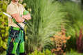 Professional Caucasian Gardener Staying Next to Beautiful Matured Garden - PhotoDune Item for Sale