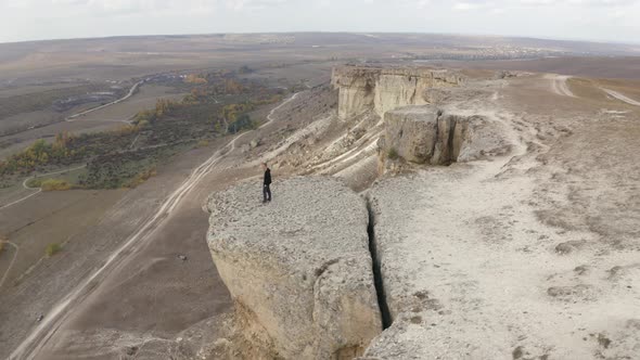 Aerial View Man Standing Onobservation Deck with Amazing Mountain Landscape