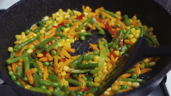 Mix Of Different Vegetables Fried In A Hot Frying Pan