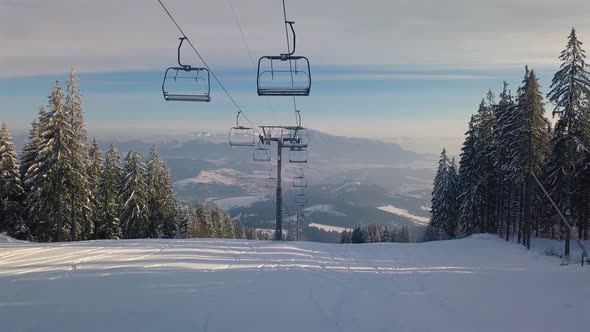 Ski Resort Closed Due to Covid 19, No People on Ski Lift, Empty Cable-way Stopped in Sunny Winter