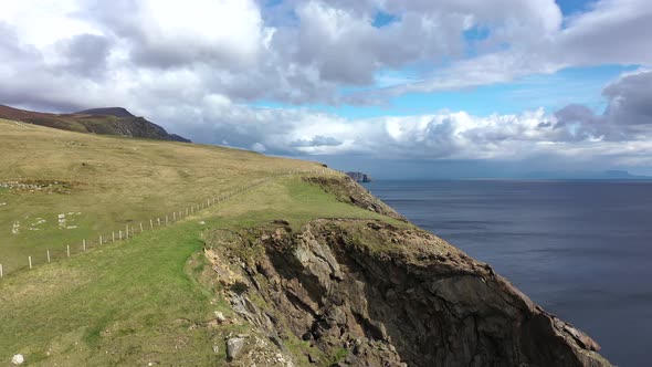 Aerial View of the Beautiful Coast at Malin Beg with Slieve League in the Background in County