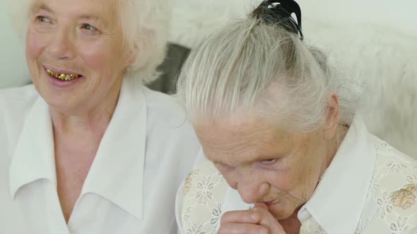 Portrait of Greyhaired Grandmothers