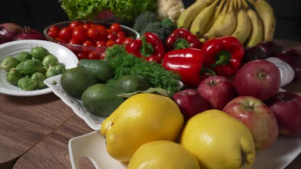 Fresh Fruits and Vegetables on Dark Kitchen Table