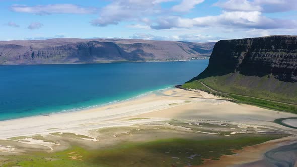 Iceland. Aerial view on the coast, mountains and ocean. Beach and sea from air.