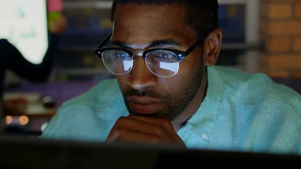 Businessman working on computer in a modern office 4k