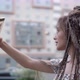 Young Beautiful and Cute Girl Takes a Selfie on Her Phone - VideoHive Item for Sale