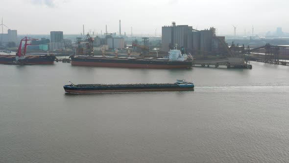 Bulk Carrier Ship Moving Through the Port of Rotterdam