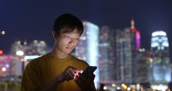 Man Use of Smart Phone at Night