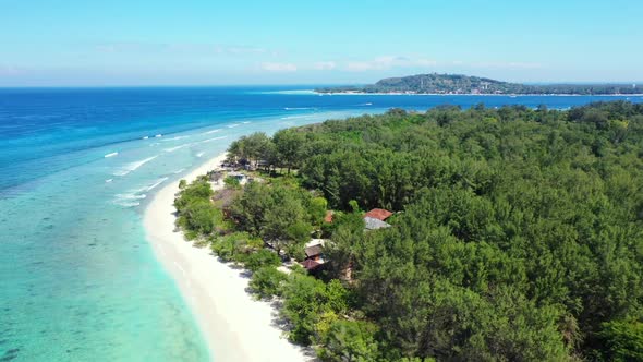 Aerial drone sky of idyllic resort beach voyage by aqua blue water with white sandy background of a 