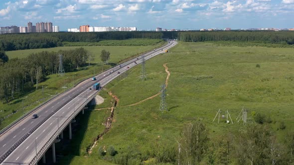 Car Highway in the Green Area of the Suburbs