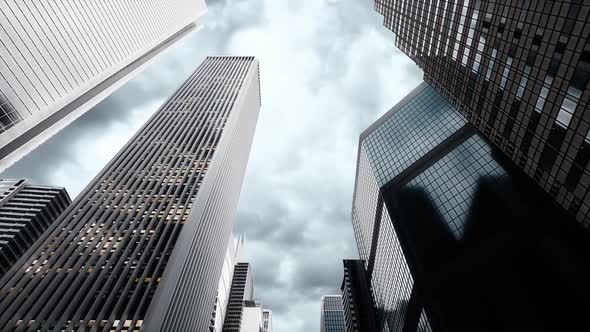 Looking up at business buildings