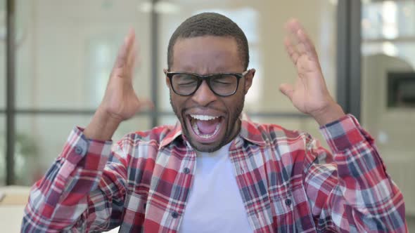 Portrait of African Man Shouting Screaming