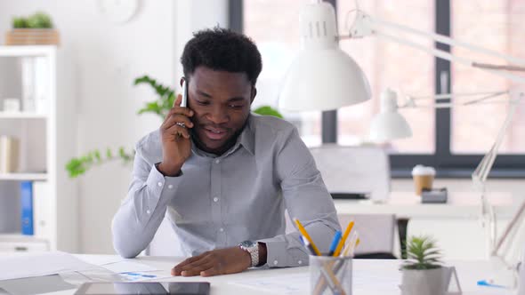 Businessman Calling on Smartphone at Office 11