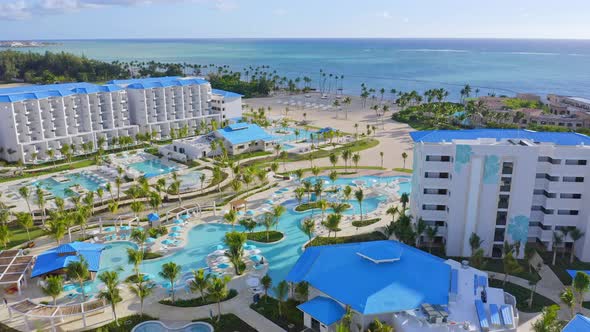 Tui Blue Sensatori resort at Cap Cana and sea in background, Dominican Republic. Aerial forward