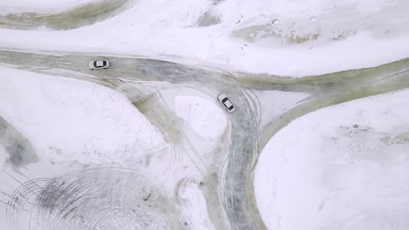 Drone Aerial View of Training Circuit on Frozen Lake with Sport Cars Training on It Before