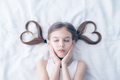Beautiful girl with heart-shaped ponytails and closed eyes - PhotoDune Item for Sale