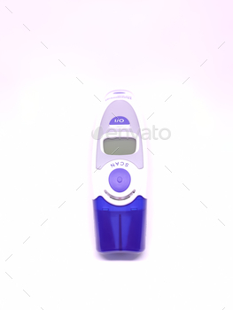 Closeup shot of an infrared thermometer isolated on a white background