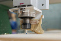 Chipboard milling on the machine with CNC closeup. - PhotoDune Item for Sale