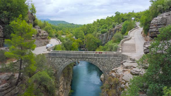 Tourists on Old Bridge in Koprulu Canyon