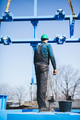 Manual worker working at shipyard construction site - PhotoDune Item for Sale