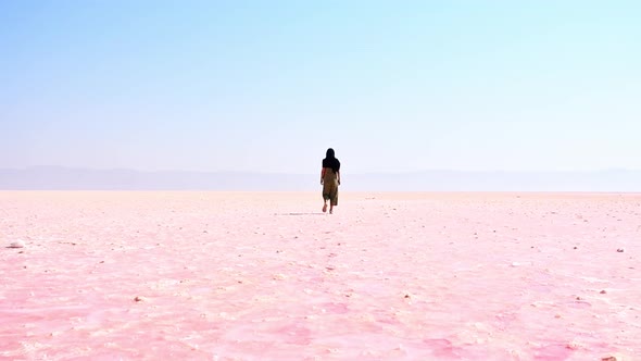 Woman Walk On Salt Lake