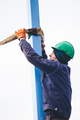Manual worker working at shipyard construction site - PhotoDune Item for Sale