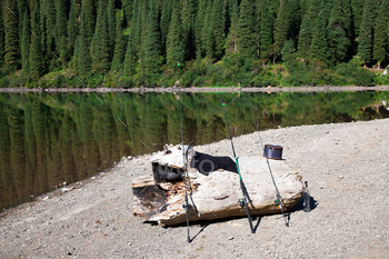 Fishing rods on the shore of the lake