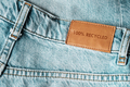 Jeans labeled 100% recycled. Sustainable fashion, conscious consumption. - PhotoDune Item for Sale