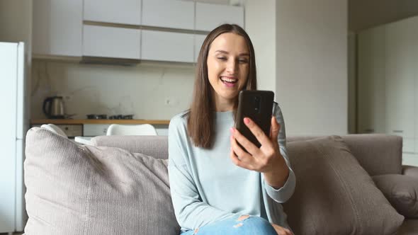 Woman Using Smartphone for Video Call