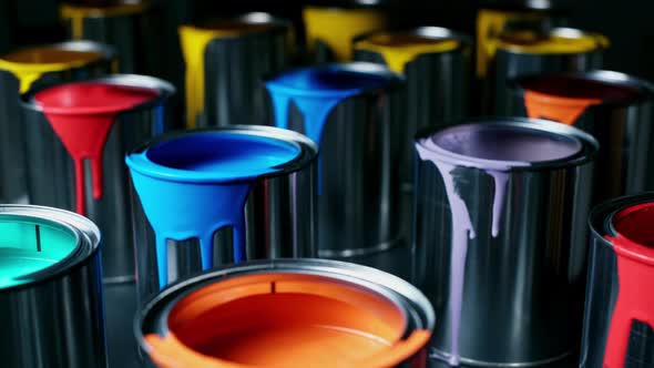 Colorful Paint of a Metal Bucket. Isolated on a Black Background.