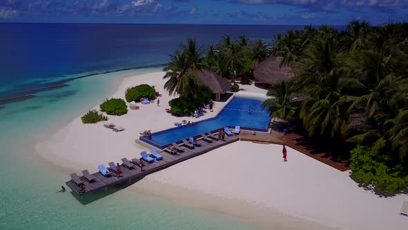 Aerial above abstract of paradise shore beach journey by blue sea with white sandy background of a d