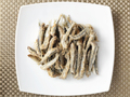 Fried anchovies in the dish, ready to be eaten - PhotoDune Item for Sale