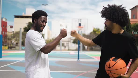 African American friends playing basketball outdoor - Urban sport lifestyle concept