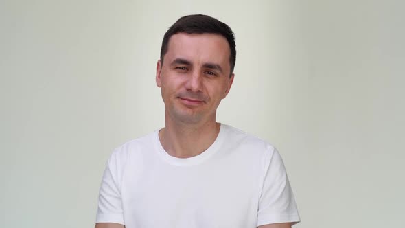 Charismatic Smiling Happy Man Clapping Hands on White Background.